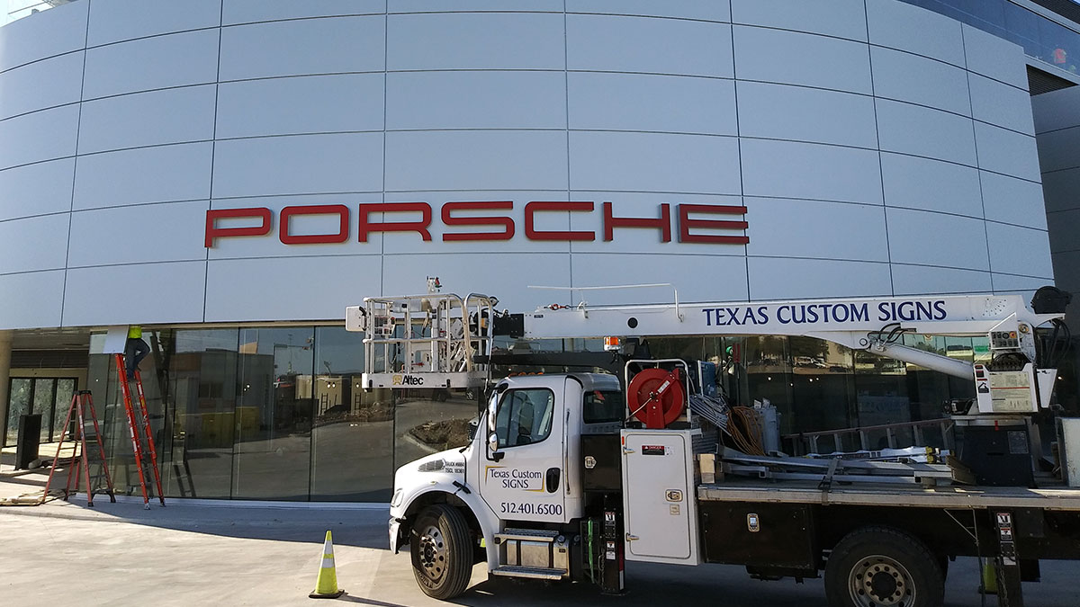 Porsche wall sign installation in Austin, Texas
