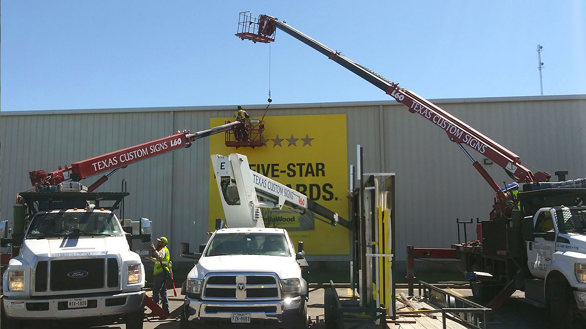 Yellawood Building Sign Installation In Columbus, Texas