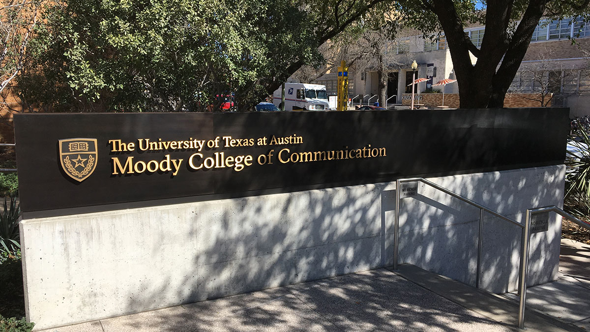 Brass dimensional letters on bronze at Moody College of Communication at The University of Texas in Austin, TX